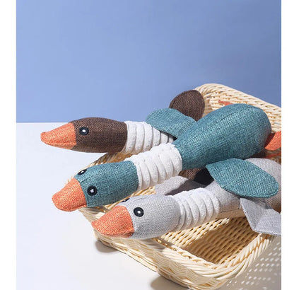 Dogs bite geese with their mouths, making sounds, playing fish, biting pets, cleaning teeth, interactive training for pets Whole