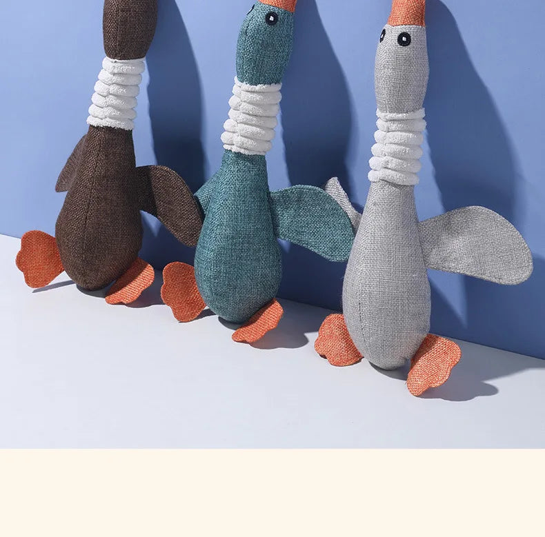 Dogs bite geese with their mouths, making sounds, playing fish, biting pets, cleaning teeth, interactive training for pets Whole